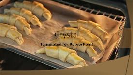  Presentation with baking - Amazing PPT theme having raw croissants on baking sheet in oven backdrop and a gold colored foreground
