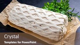  Presentation with puff pastry - Presentation design with raw kasseler pork steak as piece in puff pastry with herbs as closeup offered on brown paper and black background with copy space background and a coral colored foreground