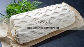  Presentation with puff pastry - Presentation theme enhanced with raw kasseler pork steak as piece in puff pastry with herbs as closeup offered on brown paper and black background with copy space background and a light gray colored foreground