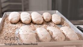  Presentation with bakery - Presentation theme consisting of raw loaves of bread on table in bakery background and a coral colored foreground