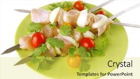  Presentation with green plate - Presentation consisting of raw uncooked chicken shish kebabs with tomatoes on metal steel skewers on green plate isolated over white background background and a yellow colored foreground