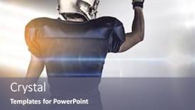  Presentation with spotlight - Amazing PPT layouts having rear view of american football player pointing against spotlight backdrop and a gray colored foreground