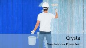  Presentation with paint roller - Amazing slide set having rear view of man using paint roller against wooden planks backdrop and a light blue colored foreground