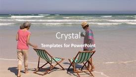  Presentation with sunshine - Theme enhanced with rear view of senior couple with sun lounger standing on beach in the sunshine background and a gray colored foreground