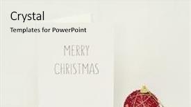  Presentation with christmas card - Amazing presentation having red christmas ball and a white greeting card with the text merry christmas in a white scene backdrop and a sky blue colored foreground