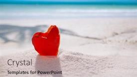  Presentation with sand heart - Audience pleasing presentation theme consisting of red heart shaped sea glass on white sand beach with seascape backdrop and a soft green colored foreground