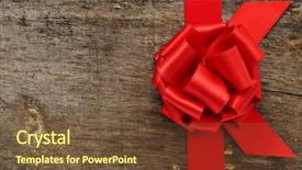  Presentation with red bow - Beautiful PPT theme featuring red ribbon with a bow on an old wooden surface with a copy-space backdrop and a tawny brown colored foreground
