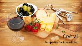  Presentation with red wine cheese - Audience pleasing theme consisting of red wine with cheese olives bread vegetables and spices on wooden table backdrop and a gold colored foreground