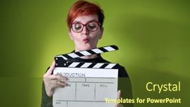  Presentation with movie studio - Beautiful presentation theme featuring redhead-woman-holding-movie-clapper backdrop and a tawny brown colored foreground