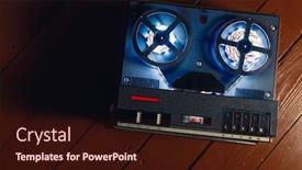  Presentation with tape recorder - Audience pleasing PPT theme consisting of reel-to-reel-audio-tape backdrop and a wine colored foreground