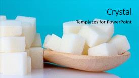  Presentation with sugar - Colorful slides enhanced with refined sugar in wooden spoon on blue background backdrop and a cyan colored foreground