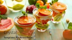  Presentation with blue mint - Slides having refreshing cocktails with ice mint pomegranate seeds and slices of fruits on blue wooden background background and a gold colored foreground