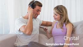  Presentation with mobile home - Slide deck having relaxed young couple listening music with mobile phone on couch at home background and a coral colored foreground