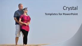  Presentation with honeymoon - PPT theme having relaxed young pasionate couple enjoying the sunset beauty on their honeymoon on a desert with orange background background and a light blue colored foreground