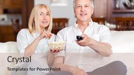  Presentation with active seniors senior couple - Cool new presentation theme with remote sensing - senior couple watching tv backdrop and a soft green colored foreground