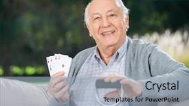  Presentation with nursing - Presentation theme having portrait of happy senior man holding four aces while sitting on couch at nursing home porch background and a light blue colored foreground