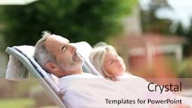  Presentation with senior spa - Beautiful theme featuring senior couple in spa hotel relaxing in long chairs backdrop and a coral colored foreground