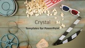  Presentation with cinema - PPT theme consisting of retro-cinema-objects-on-wooden background and a mint green colored foreground