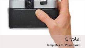  Presentation with camera film - Theme having retro film camera in hand background and a soft green colored foreground