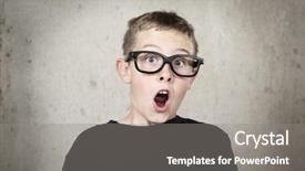  Presentation with black - PPT theme consisting of revelation - surprised boy with black glasses background and a gray colored foreground