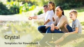  Presentation with multitasking career family - Beautiful slide set featuring river park - young family of four sitting backdrop and a soft green colored foreground