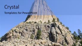  Presentation with devil - Slide set having shale rock - devil's tower background and a light blue colored foreground