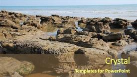  Presentation with beach rocks - Colorful PPT theme enhanced with rocks-and-boulders-exposed backdrop and a tawny brown colored foreground