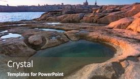  Presentation with malta - Beautiful PPT layouts featuring rocky-coastline-of-malta backdrop and a tawny brown colored foreground