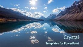 Presentation with rocky mountains - Audience pleasing presentation theme consisting of rocky-mountains-cold-sunny-autumn backdrop and a ocean colored foreground