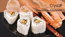  Presentation with cucumber cream - Theme consisting of roll with cucumber cream cheese with raw tuna and salmon inside on black dish with boiled crab japanese traditional cuisine background and a coral colored foreground