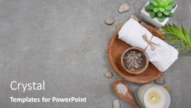  Presentation with spa concept stone - Audience pleasing presentation design consisting of rolled towels and salt backdrop and a gray colored foreground