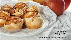 Presentation with apple - Audience pleasing PPT theme consisting of rose shaped pastry with apple backdrop and a  colored foreground