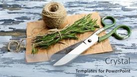  Presentation with parchment - Presentation theme enhanced with rosemary sprigs with rope and scissors on parchment on wooden background background and a light blue colored foreground