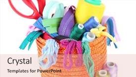  Presentation with everything - Audience pleasing slides consisting of round orange box full of multicoloured threads and everything necessary for sewing on white background isolated backdrop and a coral colored foreground