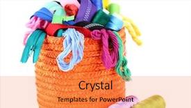  Presentation with everything - Slides with round orange box full of multicoloured threads and everything necessary for sewing on white background isolated background and a gold colored foreground