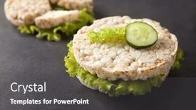  Presentation with round table - Slide deck enhanced with round rice crispbreads with cucumber and lettuce on table closeup background and a dark gray colored foreground