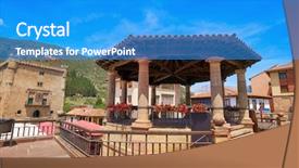  Presentation with roundabout - PPT theme consisting of potes village roundabout in cantabria background and a teal colored foreground