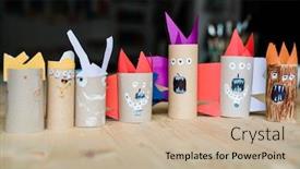  Presentation with scary - Beautiful PPT layouts featuring row of several scary halloween toys and decorations made up of rolled paper by schoolkids in studio backdrop and a mint green colored foreground