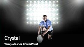  Presentation with kneeling - Amazing PPT layouts having rugby player holding ball while kneeling against spotlight backdrop and a black colored foreground