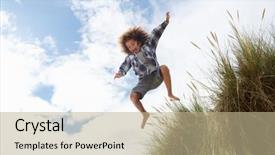  Presentation with jumping into the ocan - PPT theme featuring run down - boy jumping over dune background and a mint green colored foreground