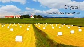  Presentation with constructions - Slide deck featuring rural pastoral after harvesting big field with haystacks the farm and different economic constructions is in the distance visible background and a light blue colored foreground