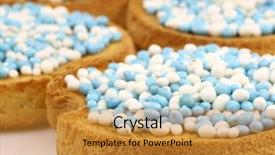  Presentation with sprinkles - Audience pleasing presentation theme consisting of rusks with white and blue anise seed sprinkles served in holland when a baby boy is born on a white background backdrop and a gold colored foreground