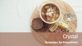  Presentation with vodka - Beautiful presentation theme featuring russian traditional fish soup - ukha served with bread lemon tomato and vodka backdrop and a coral colored foreground