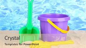  Presentation with sand play - Presentation theme having s beach toys on sand background and a  colored foreground