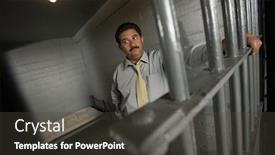  Presentation with prison bars - Amazing PPT theme having sad-businessman-standing-behind-bars backdrop and a dark gray colored foreground