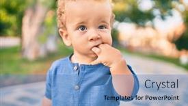  Presentation with teeth pain - Amazing PPT theme having sad-little-boy-putting-fingers backdrop and a teal colored foreground