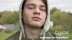  Presentation with sad - PPT theme enhanced with sad teenager boy in jacket with hood outdoors portrait background and a violet colored foreground