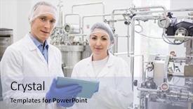  Presentation with control - PPT theme consisting of scientists using tablet to control vats in the lab background and a light blue colored foreground