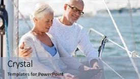  Presentation with boat tourism - Presentation theme with sailing technology tourism travel and people concept - happy senior couple with tablet pc computer on sail boat or yacht deck floating in sea background and a light blue colored foreground