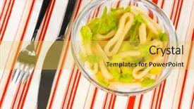  Presentation with buah jeruk lemon - Beautiful slide set featuring salad of squid rings lemon and lettuce in a glass bowl on striped tablecloth close-up backdrop and a yellow colored foreground